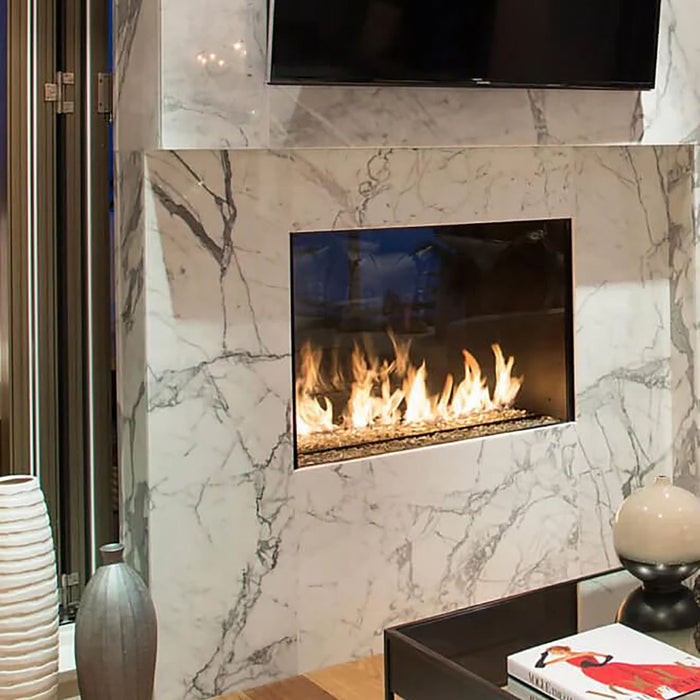 Innovative R324STIO 2-sided fireplace, connecting indoor and outdoor living spaces elegantly.